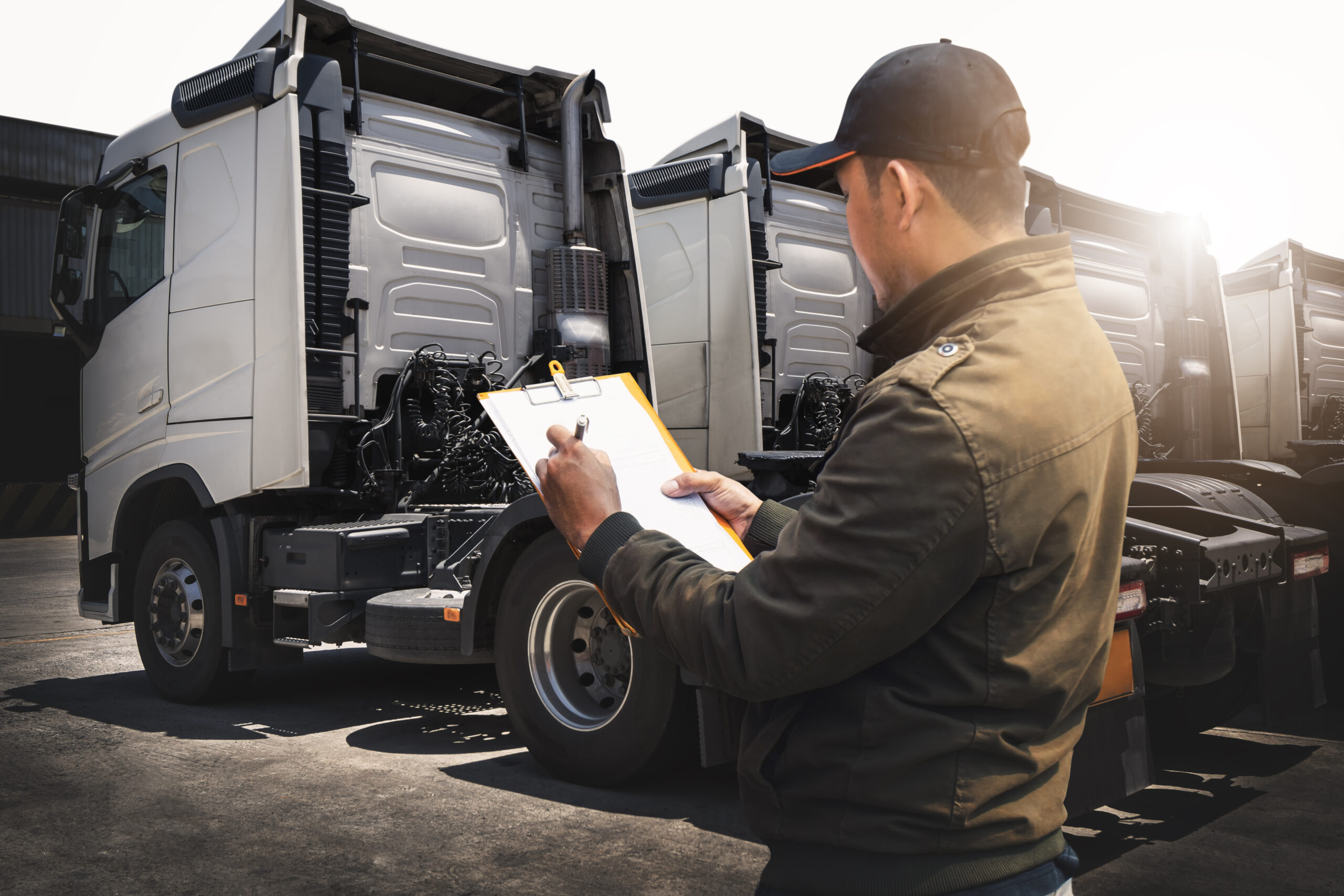 truck drivers checking trucks safety semi trucks maintenance truck inspection scaled